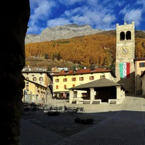 la magnifica terra, bormio la conca alpina baciata dal sole